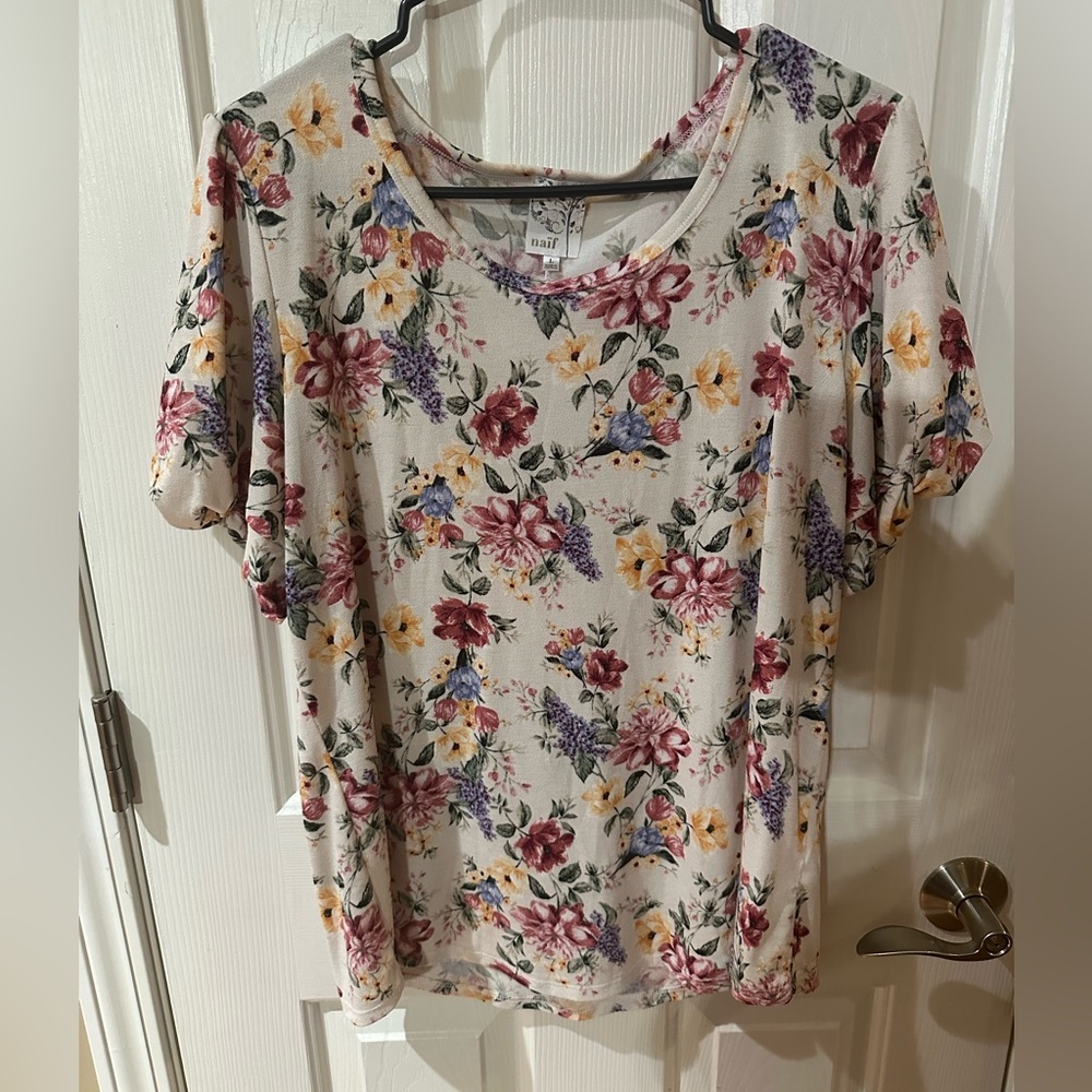 Naif floral print blouse with ruffle sleeves. Size Large
